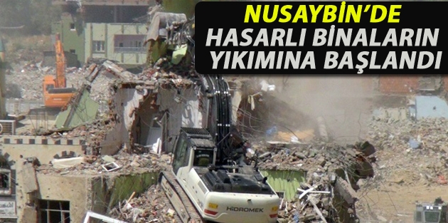 Nusaybin’de hasarlı binaların yıkımına başlandı