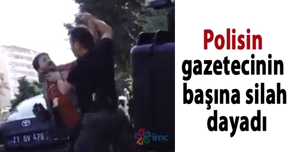 Polisin gazetecinin başına silah dayadığı görüntüler ortaya çıktı