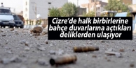 Cizre’de halk birbirlerine bahçe duvarlarına açtıkları...