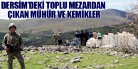 Dersim'deki toplu mezardan çıkan mühür ve kemikler